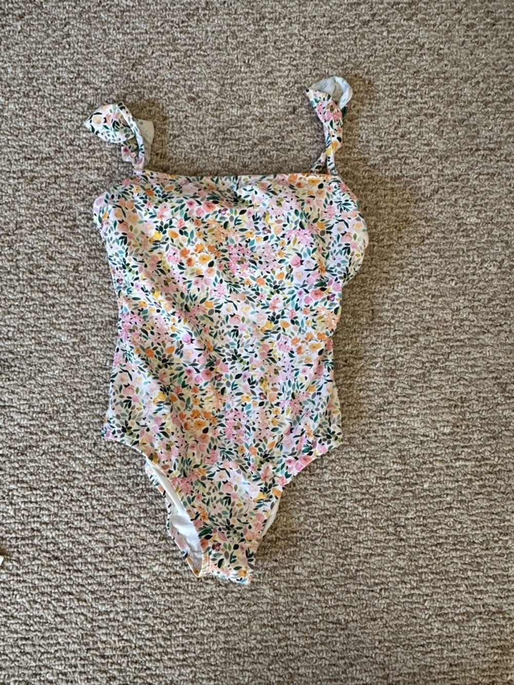 Kona Sol Floral Swimsuit. Floral one piece swim suit. Flounce one piece swimsuit